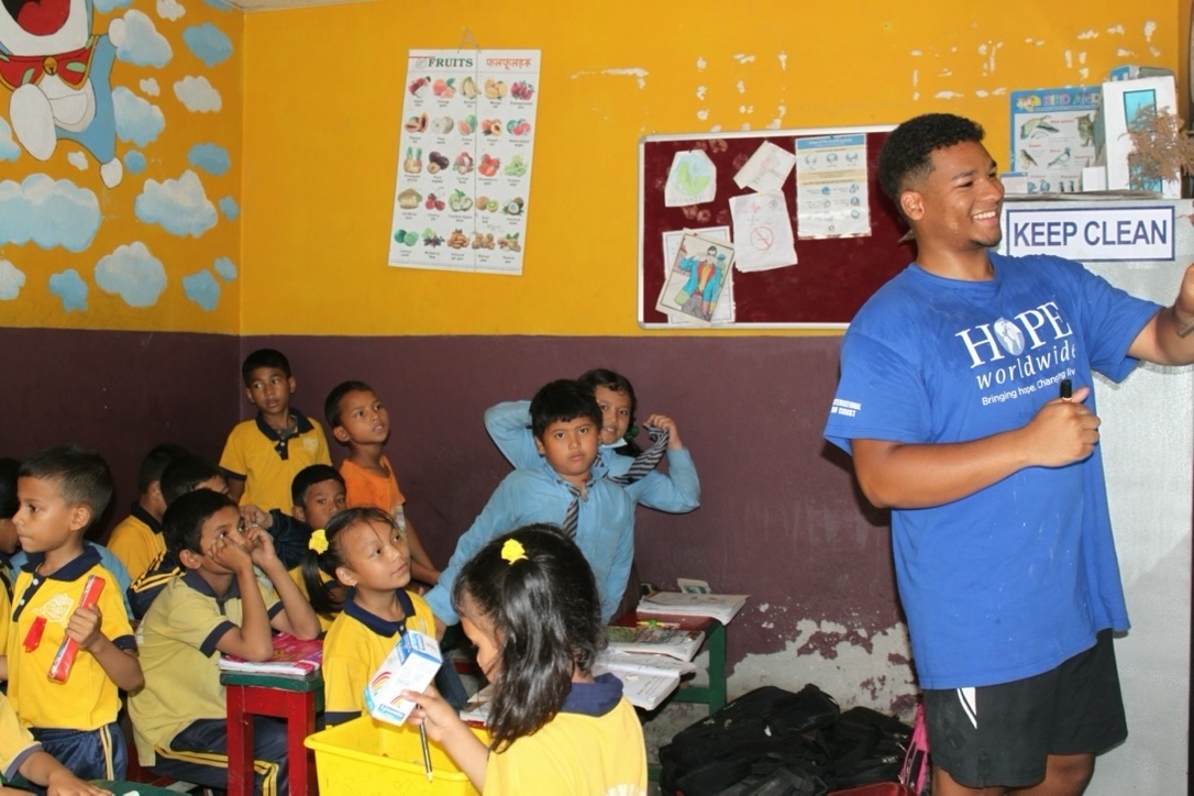 Shawn teaching English to students at HOPE worldwide Nepal