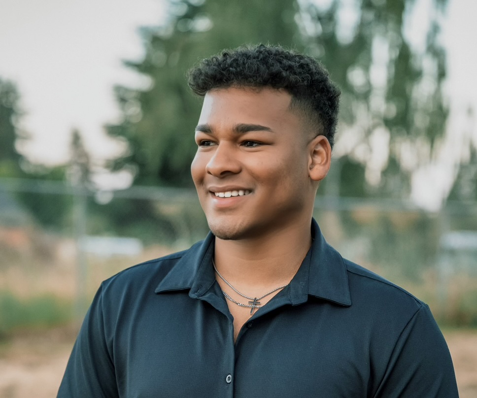 Shawn Reddy smiling outdoors